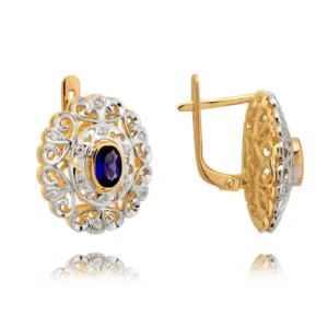 Klasyczne kolczyki ze złota z dekoracyjnym kamieniem.