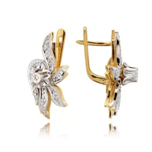 Klasyczne kolczyki ze złota z dekoracyjnym kamieniem.