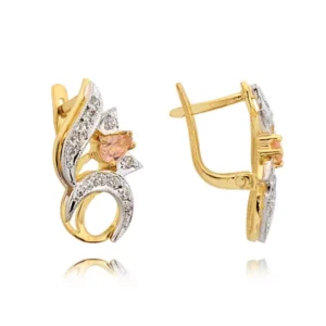 Klasyczne kolczyki ze złota z dekoracyjnym kamieniem.