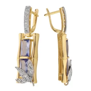 Uniwersalne kolczyki złote o eleganckim wykończeniu.