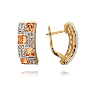 Złote kolczyki łączące elegancję i nowoczesny design.