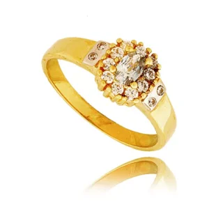 Złoty pierścionek podkreślający subtelny blask kamieni.