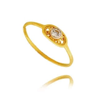 Pierścionek ze złota łączący klasykę z nowoczesnością.