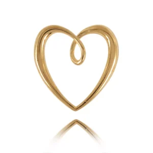 Złoty wisiorek jako elegancki dodatek.