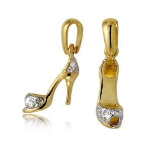 Wisiorek ze złota o delikatnym połysku.